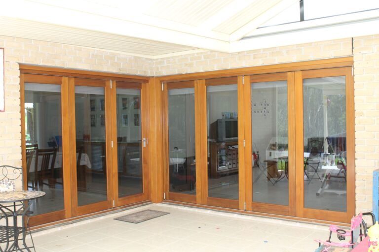 Bifold doors in natural wood colour